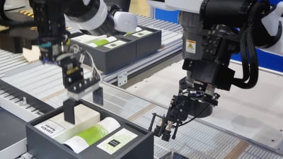 Machine uses artificial intelligence to detect product defects in manufacturing facility